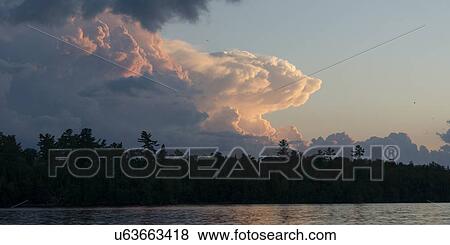 Stock Photo - Lake at sunset, Lake Of The Woods, Keewatin, Ontario, Canada. Fotosearch