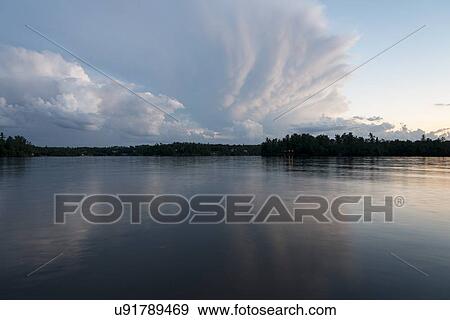 Stock Photo - Lake at sunset, Lake of The Woods, Keewatin, Ontario, Canada. Fotosearch