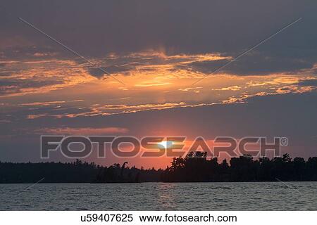 Lake at sunset, Lake of The Woods, Keewatin, Ontario, Canada View Large Photo Image Stock Photography - Lake at sunset, Lake of The Woods, Keewatin, Ontario, Canada. Fotosearch