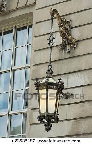 Stock Photo - Lantern hanging on the wall of a building, Michigan Avenue, Chicago, Cook County, Illinois, USA. Fotosearch