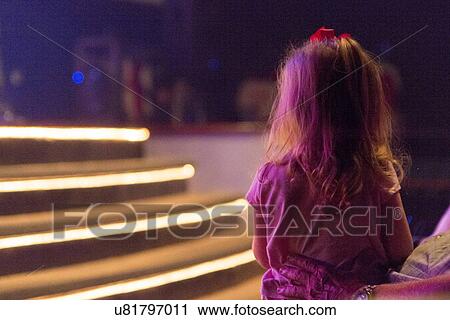 Little girl on stage at Hughes American Family Theater, Branson, Taney County, Missouri, USA View Large Photo Image Stock Image - Little girl on stage at Hughes American Family Theater, Branson, Taney County, Missouri, USA. Fotosearch