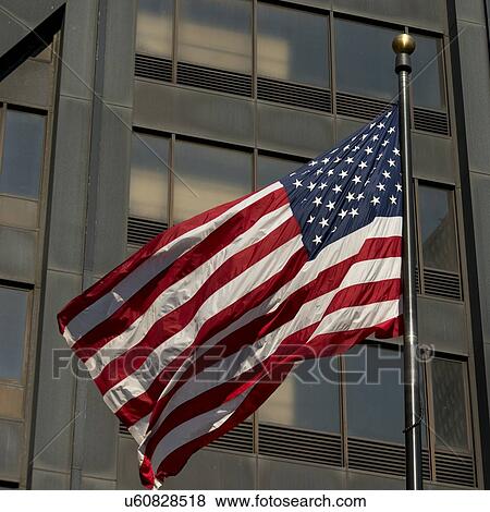 Low angle view of American flag, East Chestnut Street, Chicago, Cook County, Illinois, USA View Large Photo Image Stock Photo - Low angle view of American flag, East Chestnut Street, Chicago, Cook County, Illinois, USA. Fotosearch