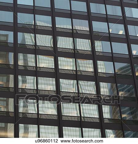 Low angle view of an office building, Wacker Drive, Chicago, Cook County, Illinois, USA View Large Photo Image Stock Image - Low angle view of an office building, Wacker Drive, Chicago, Cook County, Illinois, USA. Fotosearch