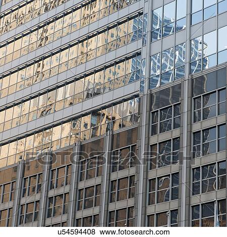 Low angle view of an office building, Randolph Street, Chicago, Cook County, Illinois, USA View Large Photo Image Stock Photo - Low angle view of an office building, Randolph Street, Chicago, Cook County, Illinois, USA. Fotosearch