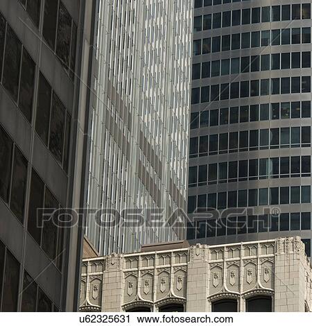 Stock Image - Low angle view of buildings in a city, Monroe Street, Chicago, Cook County, Illinois, USA. Fotosearch
