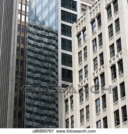 Low angle view of buildings in a city, Chicago, Cook County, Illinois, USA View Large Photo Image Stock Photo - Low angle view of buildings in a city, Chicago, Cook County, Illinois, USA. Fotosearch