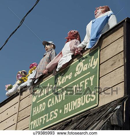 Low angle view of confectionery store sign with sculptures, Branson, Taney County, Missouri, USA View Large Photo Image Stock Image - Low angle view of confectionery store sign with sculptures, Branson, Taney County, Missouri, USA. Fotosearch