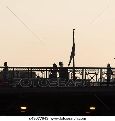 Stock Image - Low angle view of people on a bridge, Michigan Avenue, Chicago, Cook County, Illinois, USA. Fotosearch