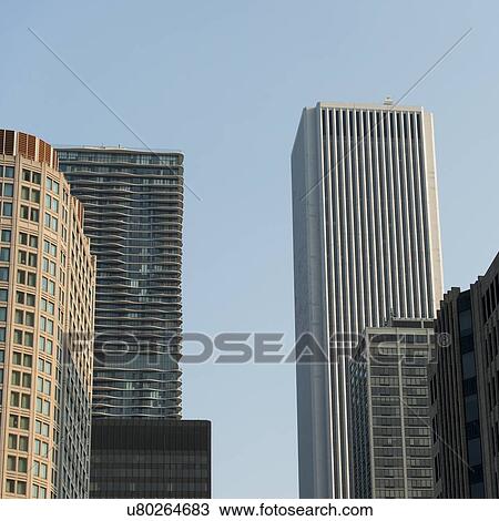 Low angle view of skyscrapers in Chicago, Cook County, Illinois, USA View Large Photo Image Stock Image - Low angle view of skyscrapers in Chicago, Cook County, Illinois, USA. Fotosearch