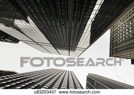Low angle view of skyscrapers, West Madison Street, Chicago, Cook County, Illinois, USA View Large Photo Image Stock Photo - Low angle view of skyscrapers, West Madison Street, Chicago, Cook County, Illinois, USA. Fotosearch