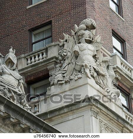 Low angle view of statues on the wall of a building, Chicago, Cook County, Illinois, USA View Large Photo Image Stock Image - Low angle view of statues on the wall of a building, Chicago, Cook County, Illinois, USA. Fotosearch