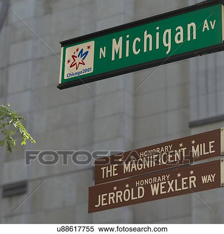 Stock Photography - Low angle view of streetsigns Magnificent Mile, Michigan Avenue, Chicago, Cook County, Illinois, USA. Fotosearch