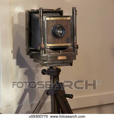 Stock Photography - Old camera on a tripod, Ontario, Canada. Fotosearch