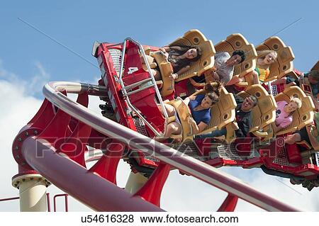 Stock Photo - People enjoying rollercoaster ride, Universal Studios, Orlando, Florida, USA. Fotosearch