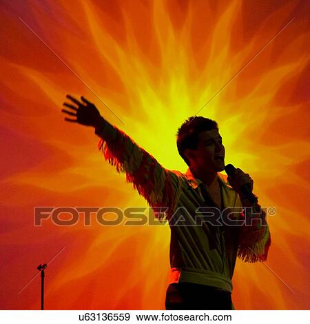 Stock Photo - Pop singer performing at Dutton Family Theater, Branson, Taney County, Missouri, USA. Fotosearch