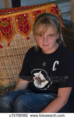 Stock Image - Portrait of a girl, Lake of The Woods, Keewatin, Ontario, Canada. Fotosearch