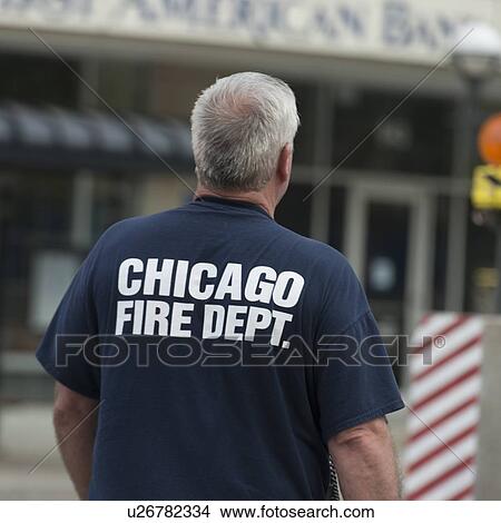 Rear view of a Fireman, Chicago, Cook County, Illinois, USA View Large Photo Image Picture - Rear view of a Fireman, Chicago, Cook County, Illinois, USA. Fotosearch