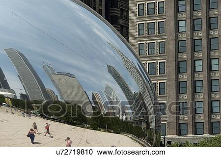 Stock Image - Reflection of buildings on Cloud Gate sculpture, Millennium Park, Chicago, Cook County, Illinois, USA. Fotosearch