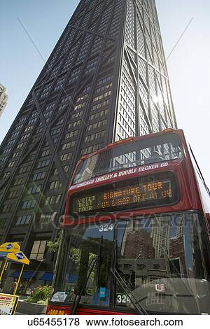 Reflection of skyscrapers on the glass of a double-decker bus, John Hancock Tower, Chicago, Cook County, Illinois, USA View Large Photo Image Stock Photo - Reflection of skyscrapers on the glass of a double-decker bus, John Hancock Tower, Chicago, Cook County, Illinois, USA. Fotosearch