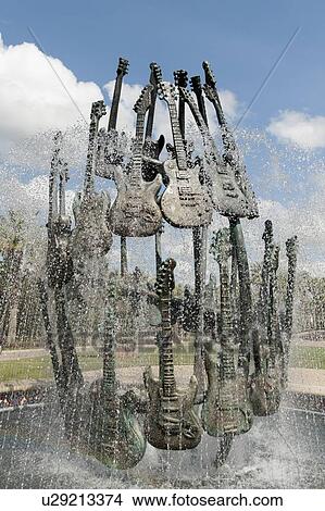 Picture - Sculptures of guitars at a fountain, Universal Studios, Orlando, Florida, USA. Fotosearch