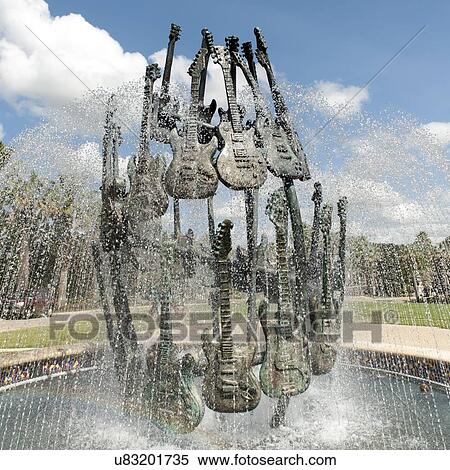 Stock Photography - Sculptures of guitars at a fountain, Universal Studios, Orlando, Florida, USA. Fotosearch