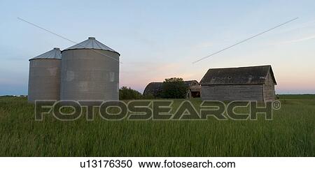 Silo and barn in a prairie field, Manitoba, Canada View Large Photo Image Stock Image - Silo and barn in a prairie field, Manitoba, Canada. Fotosearch