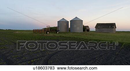 Silo and barn in a prairie field, Manitoba, Canada View Large Photo Image Stock Image - Silo and barn in a prairie field, Manitoba, Canada. Fotosearch