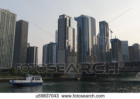 Stock Image - Skyscrapers at the waterfront, Chicago River, Chicago, Cook County, Illinois, USA. Fotosearch
