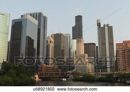 Stock Image - Skyscrapers at the waterfront, Sears Tower, North Canal Street, Chicago River, Chicago, Cook County, Illinois, USA. Fotosearch