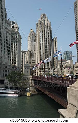 Stock Image - Skyscrapers at the waterfront, Tribune Tower, Chicago River, Chicago, Cook County, Illinois, USA. Fotosearch