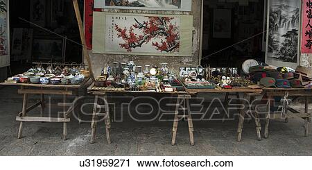 Souvenir shop display, Fuli Village, Yangshuo, Guilin, Guangxi Province, China View Large Photo Image Stock Image - Souvenir shop display, Fuli Village, Yangshuo, Guilin, Guangxi Province, China. Fotosearch