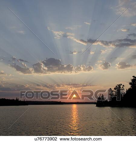 Sunset over a lake, Lake of The Woods, Ontario, Canada View Large Photo Image Stock Image - Sunset over a lake, Lake of The Woods, Ontario, Canada. Fotosearch