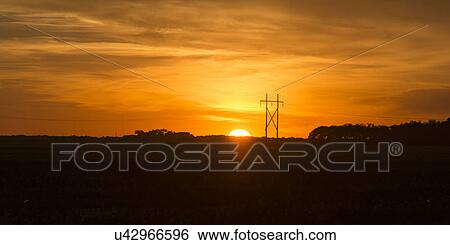 Sunset over a prairie field, Manitoba, Canada View Large Photo Image Stock Photograph - Sunset over a prairie field, Manitoba, Canada. Fotosearch