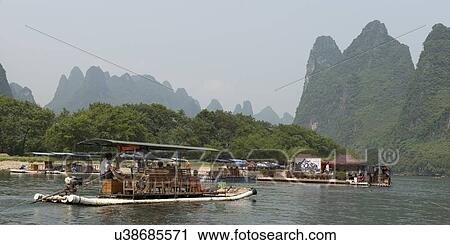 Tourboats in the Li River, Yangshuo, Guilin, Guangxi Province, China View Large Photo Image Stock Image - Tourboats in the Li River, Yangshuo, Guilin, Guangxi Province, China. Fotosearch