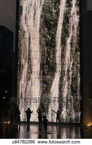 Tourists at Crown Fountain, Millennium Park, E Monroe Street, Chicago, Cook County, Illinois, USA View Large Photo Image Stock Photograph - Tourists at Crown Fountain, Millennium Park, E Monroe Street, Chicago, Cook County, Illinois, USA. Fotosearch