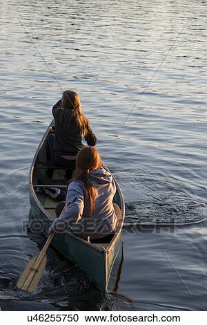Tourists boating in a lake, Lake of The Woods, Keewatin, Ontario, Canada View Large Photo Image Stock Image - Tourists boating in a lake, Lake of The Woods, Keewatin, Ontario, Canada. Fotosearch