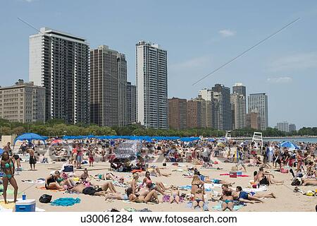 Tourists on the beach, Lake Michigan, Chicago, Cook County, Illinois, USA View Large Photo Image Picture - Tourists on the beach, Lake Michigan, Chicago, Cook County, Illinois, USA. Fotosearch