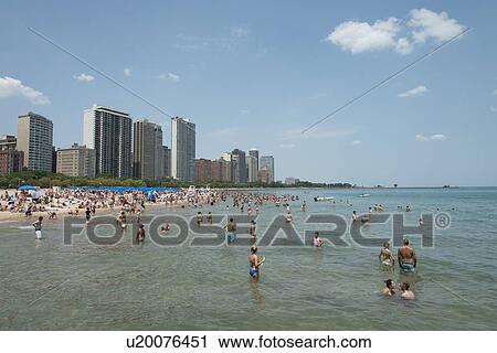 Tourists on the beach, Lake Michigan, Chicago, Cook County, Illinois, USA View Large Photo Image Stock Image - Tourists on the beach, Lake Michigan, Chicago, Cook County, Illinois, USA. Fotosearch