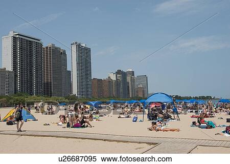 Tourists on the beach, Lake Michigan, Chicago, Cook County, Illinois, USA View Large Photo Image Stock Photography - Tourists on the beach, Lake Michigan, Chicago, Cook County, Illinois, USA. Fotosearch