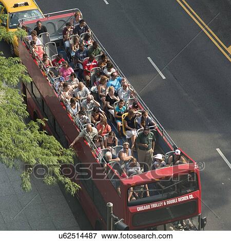 Tourists traveling in an open-air bus, Chicago, Cook County, Illinois, USA View Large Photo Image Stock Photo - Tourists traveling in an open-air bus, Chicago, Cook County, Illinois, USA. Fotosearch