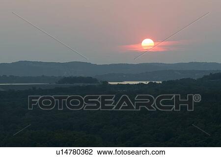 Stock Image - Valley at sunset, Hollister, Taney County, Missouri, USA. Fotosearch