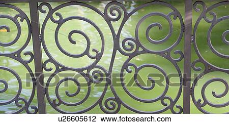 View of a pond through railing, Universal Studios, Orlando, Florida, USA View Large Photo Image Stock Image - View of a pond through railing, Universal Studios, Orlando, Florida, USA. Fotosearch