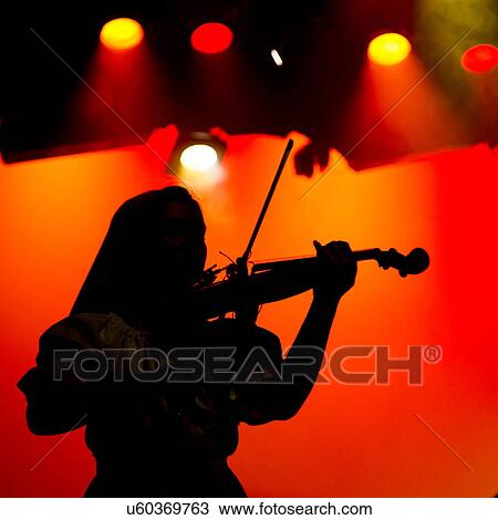Stock Image - Violinist performing at Hughes American Family Theater, Branson, Taney County, Missouri, USA. Fotosearch