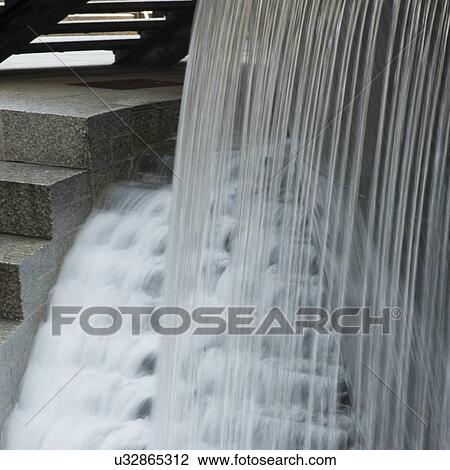 Water falling from a fountain, Chicago, Cook County, Illinois, USA View Large Photo Image Stock Image - Water falling from a fountain, Chicago, Cook County, Illinois, USA. Fotosearch