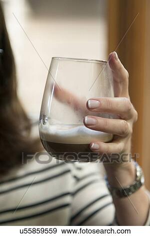 Woman enjoying a drink, Lake of The Woods, Keewatin, Ontario, Canada View Large Photo Image Stock Photo - Woman enjoying a drink, Lake of The Woods, Keewatin, Ontario, Canada. Fotosearch