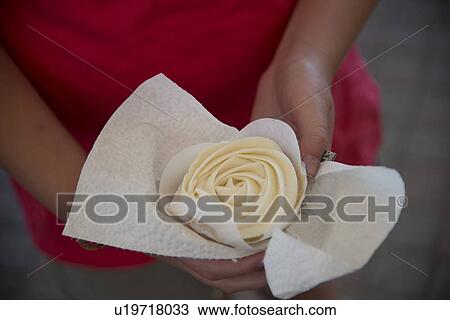 Woman holding a perfect white rose in a napkin, Kenora, Ontario, Canada View Large Photo Image Stock Image - Woman holding a perfect white rose in a napkin, Kenora, Ontario, Canada. Fotosearch