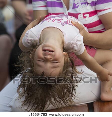 Woman playing with her daughter, Chicago, Cook County, Illinois, USA View Large Photo Image Stock Image - Woman playing with her daughter, Chicago, Cook County, Illinois, USA. Fotosearch
