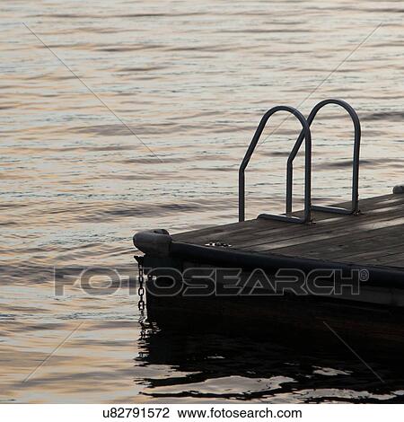 Wooden dock at Lake of The Woods, Ontario, Canada View Large Photo Image Stock Image - Wooden dock at Lake of The Woods, Ontario, Canada. Fotosearch