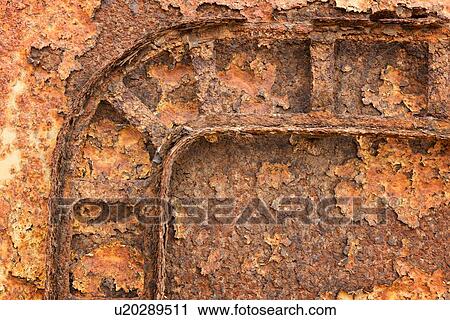 Abandoned rusty oil rig on Skeleton Coast, detail of door frame with curving lines, Namibia, South West Africa View Large Photo Image Stock Image - Abandoned rusty oil rig on Skeleton Coast, detail of door frame with curving lines, Namibia, South West Africa. Fotosearch