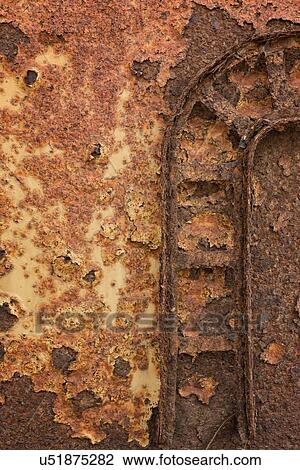 Abandoned rusty oil rig on Skeleton Coast, detail of door frame with curving lines, Namibia, South West Africa View Large Photo Image Stock Image - Abandoned rusty oil rig on Skeleton Coast, detail of door frame with curving lines, Namibia, South West Africa. Fotosearch